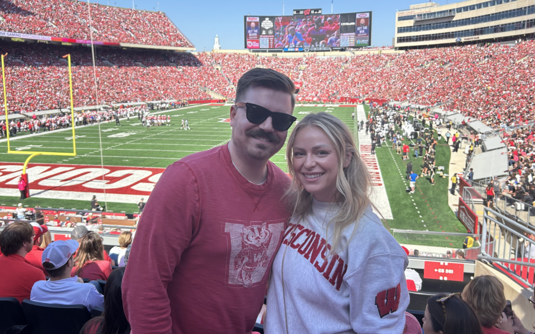 A badger fan couple at the game in Madison Wisconsin